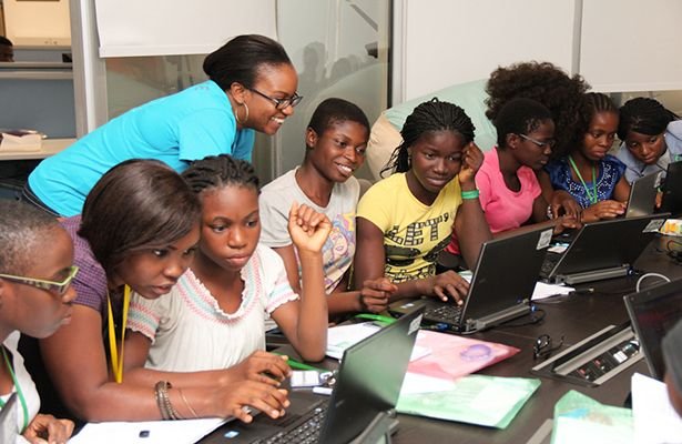 Volunteers working with girls
